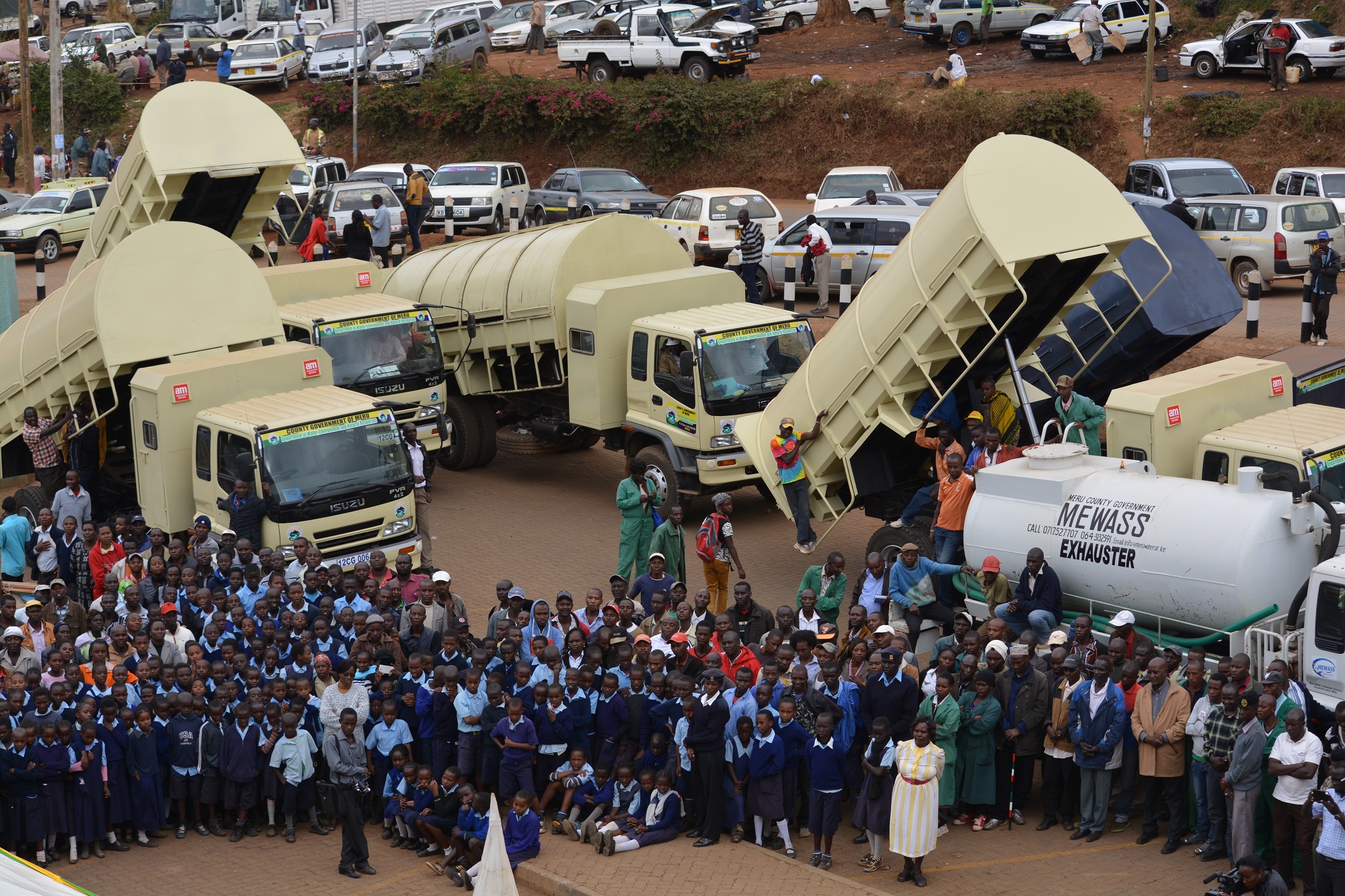 MERU GOVERNOR FLAGS OFF NEW GARBAGE TRUCKS.